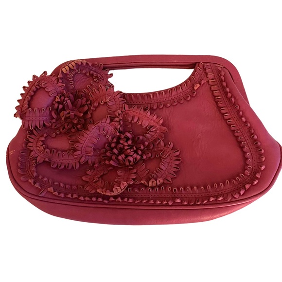 Isabella Fiore Handbags - Isabella Fiore Small Leather Pink clutch with magnetic handle.